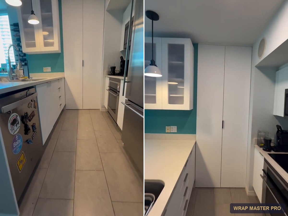 Bright white condo kitchen with an enclosed floor-to-ceiling pantry, South Florida