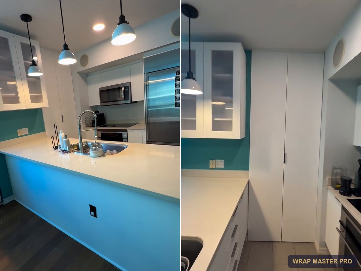 Bright white condo kitchen with an enclosed floor-to-ceiling pantry, South Florida