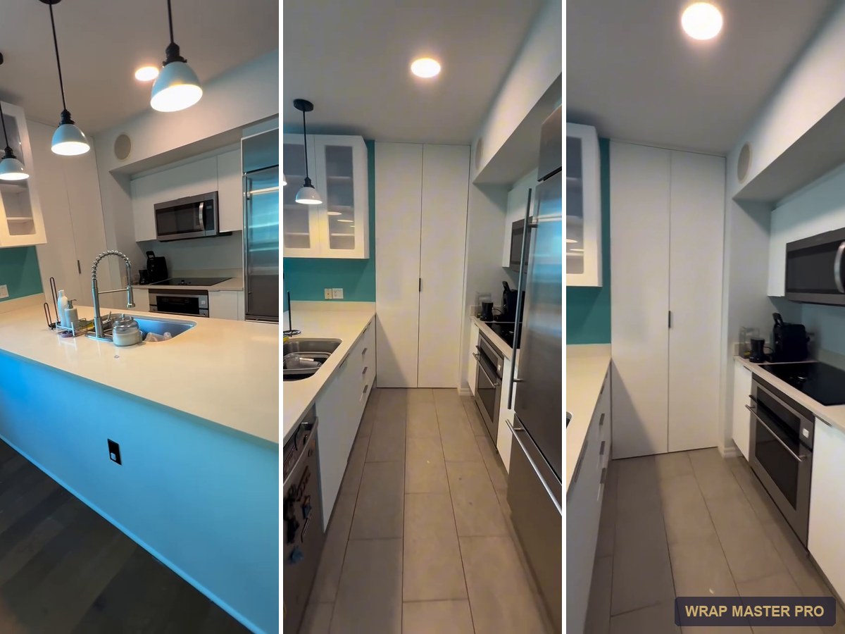 Bright white condo kitchen with an enclosed floor-to-ceiling pantry, South Florida