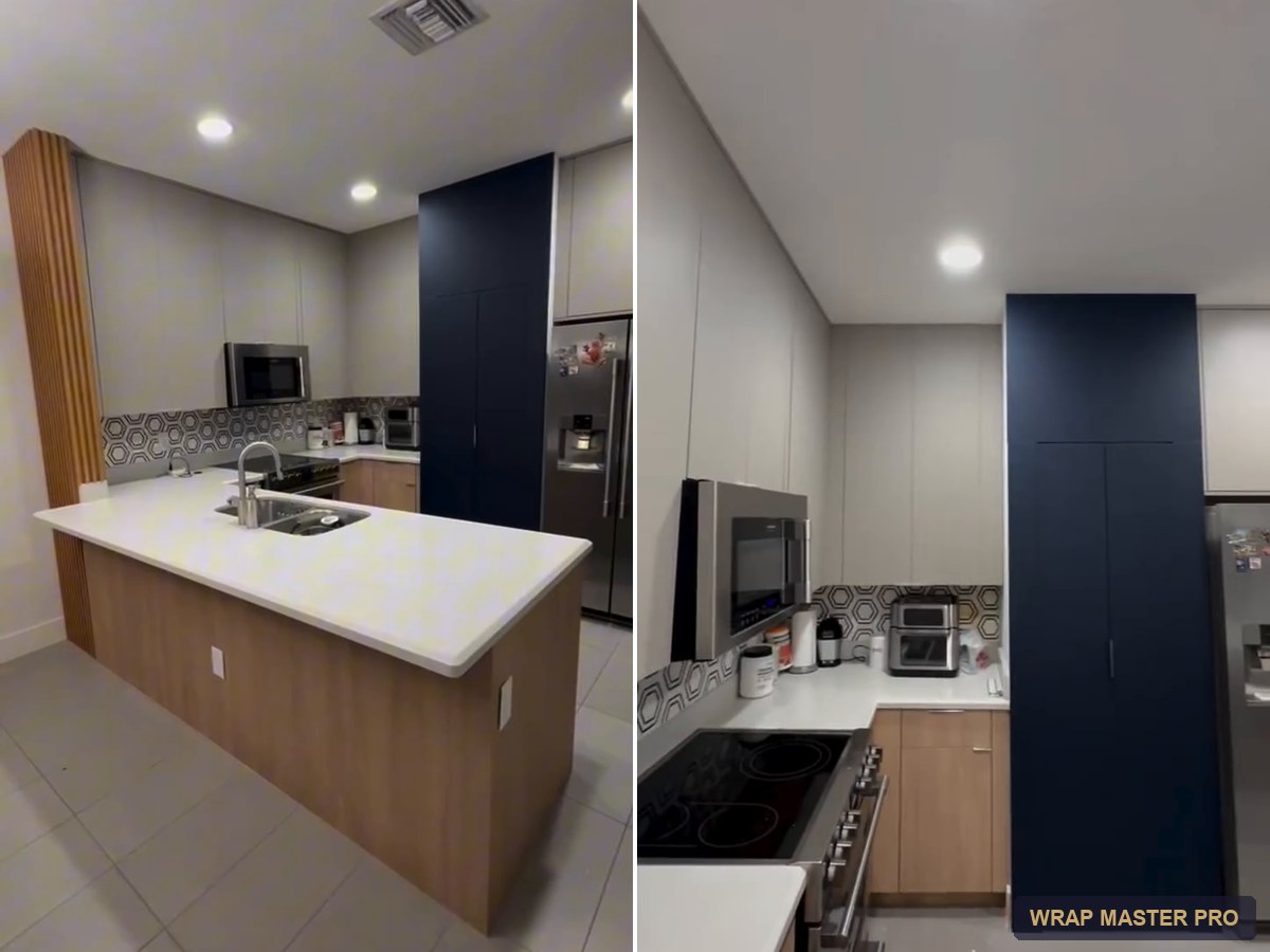 Navy acrylic pantry wall framed by light gray and woodgrain cabinets, South Florida